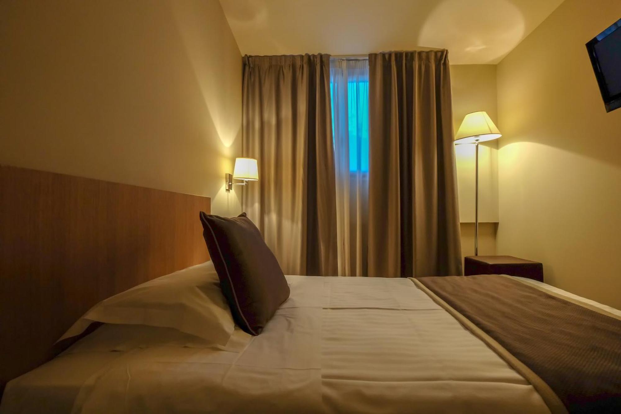 ריצ'יונה Hotel De La Ville חדר תמונה